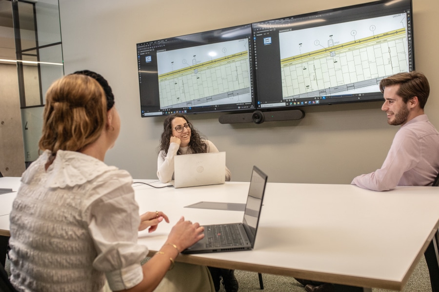 Ridge & Partners employees in a conference room using Revu