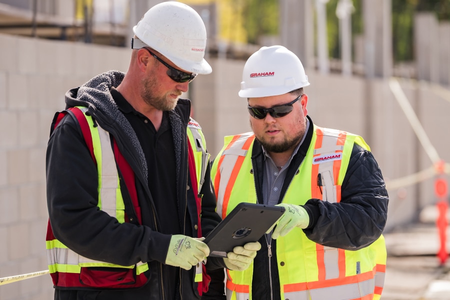 Graham Construction employees using Bluebeam's intuitive construction management tools on iPad