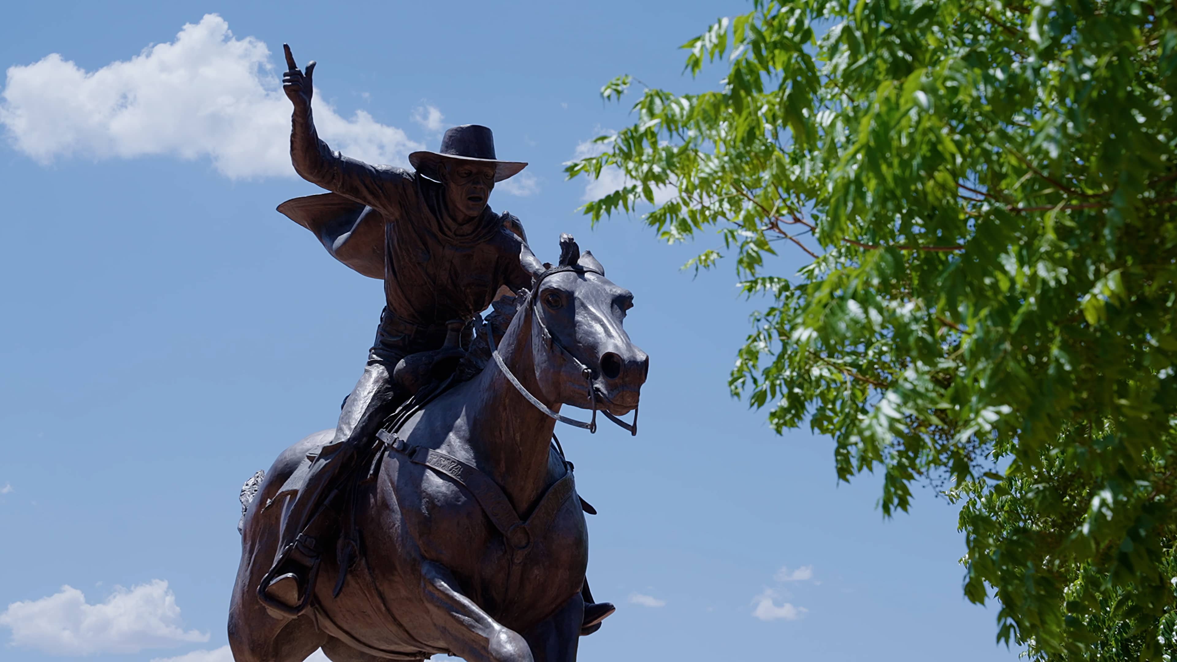 Statue of man riding horse