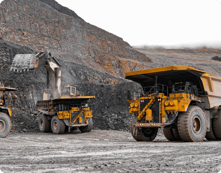 Two bulldozers at a mining site