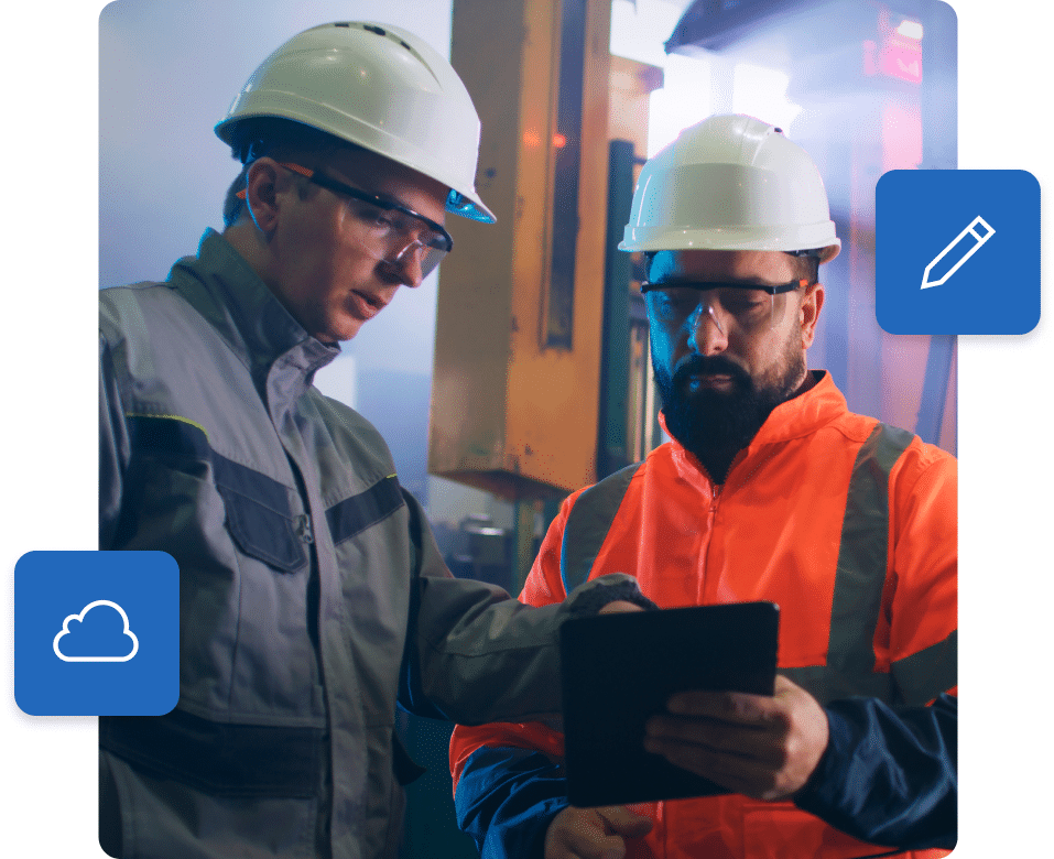 Two onsite mining workers use tablet together.